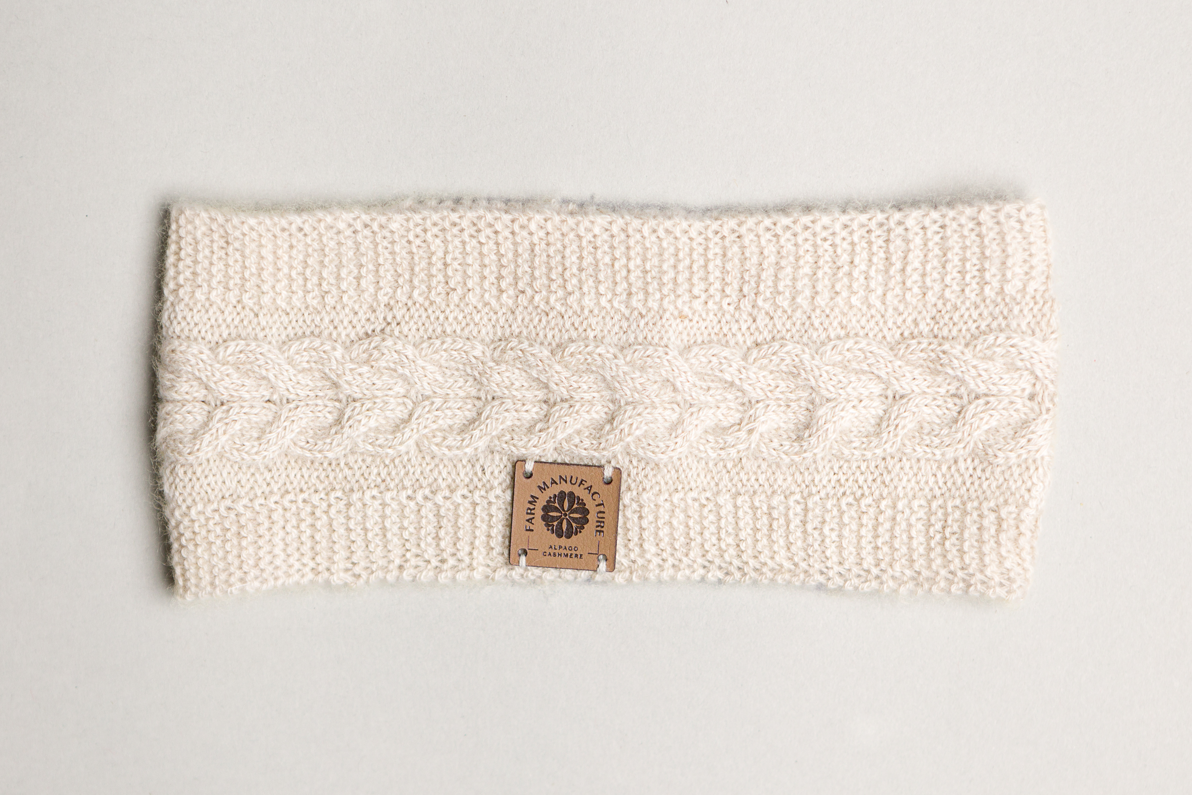 Fascia scaldaorecchie Edera con filato 100% cashmere lavorato ai ferri